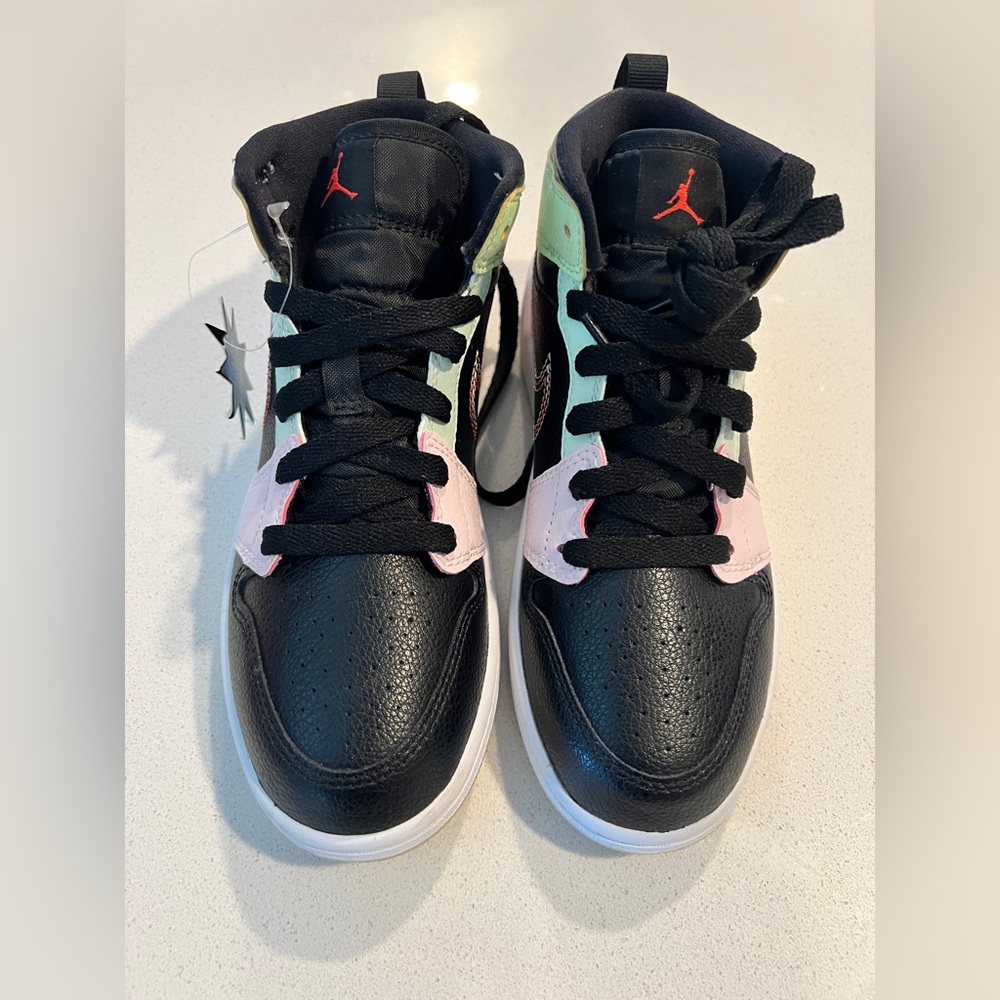 Kids gym shoes. Size 1 in a half. Brand new Air Jordans, never been worn